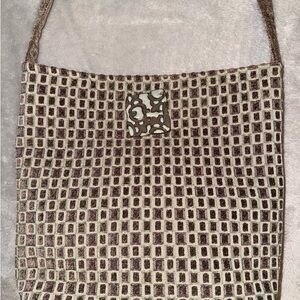 Bought this from vendor this is handmade colors, green brown cream, beautiful